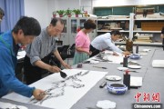 天天黄历两岸艺术家在安徽“共绘一幅画”